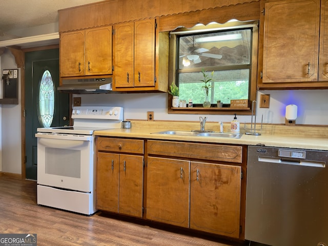 1685 Ridgeway Rd, Lafayette, GA 30728 - kitchen featuring white range with electric cooktop, dishwasher, under cabinet range hood, light wood-style floors, and light countertops