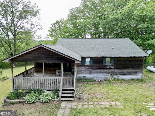 1685 Ridgeway Rd, Lafayette, GA 30728 - view of front facade featuring a deck, roof with shingles, a front yard, and crawl space