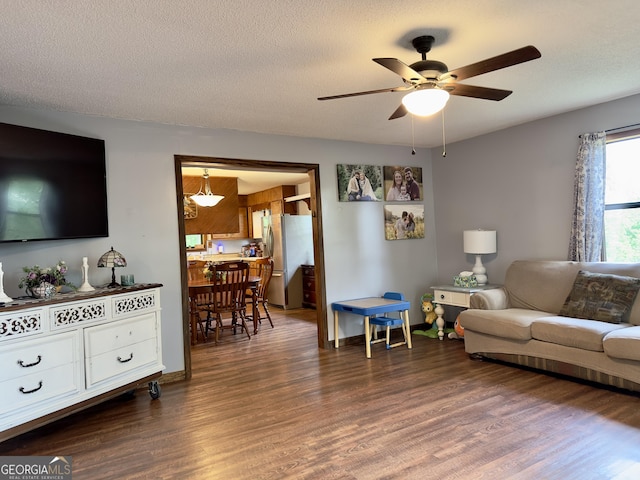 1685 Ridgeway Rd, Lafayette, GA 30728 - living area with ceiling fan, dark wood-style floors, and a textured ceiling