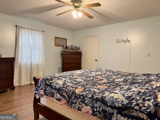 1685 Ridgeway Rd, Lafayette, GA 30728 - bedroom featuring dark wood-style floors and a ceiling fan