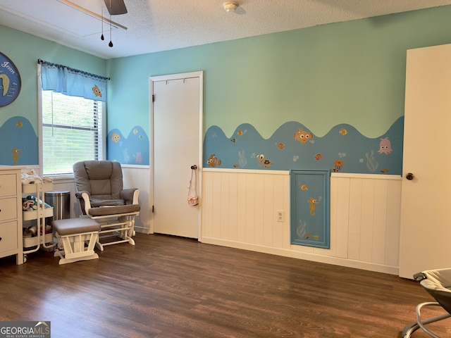 1685 Ridgeway Rd, Lafayette, GA 30728 - office area featuring a wainscoted wall, wood finished floors, a textured ceiling, ceiling fan, and attic access
