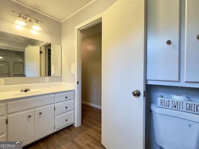 1685 Ridgeway Rd, Lafayette, GA 30728 - bathroom featuring vanity, wood finished floors, and crown molding