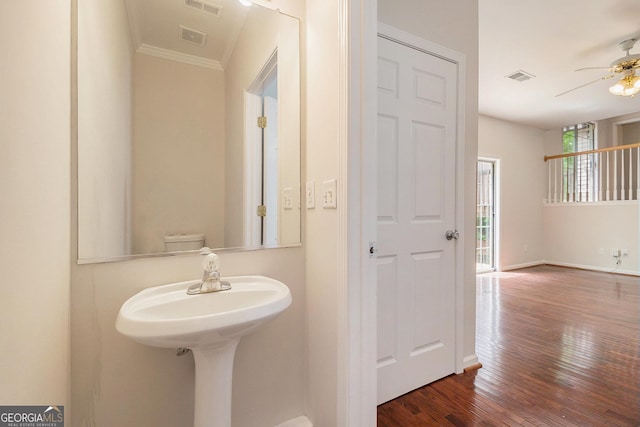 5975 Tate Dr, Austell, GA 30106 - bathroom featuring wood-type flooring, crown molding, visible vents, and ceiling fan