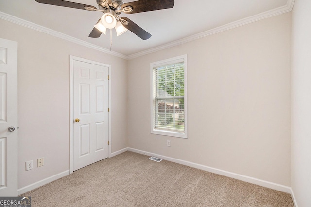 5975 Tate Dr, Austell, GA 30106 - unfurnished bedroom featuring light colored carpet, baseboards, and crown molding