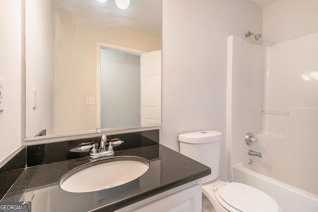 5975 Tate Dr, Austell, GA 30106 - bathroom featuring vanity, shower / bathing tub combination, and toilet