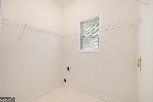 5975 Tate Dr, Austell, GA 30106 - laundry area with baseboards, laundry area, hookup for a washing machine, and light floors