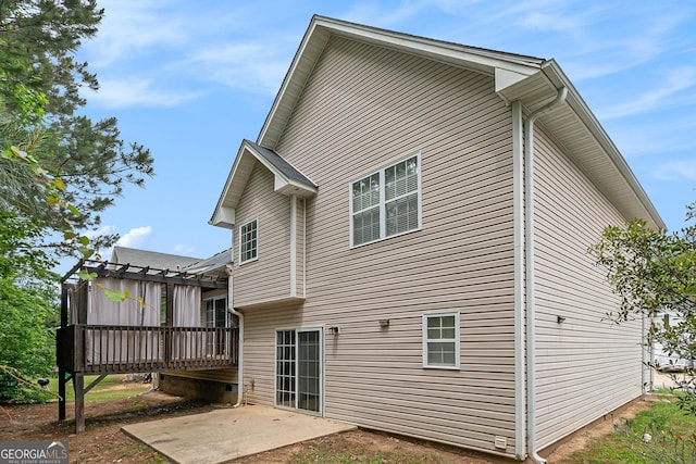 5975 Tate Dr, Austell, GA 30106 - back of property featuring a patio and a deck