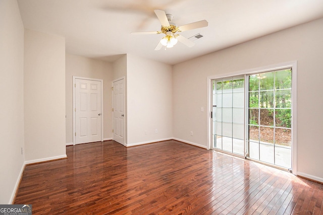 5975 Tate Dr, Austell, GA 30106 - spare room featuring baseboards, ceiling fan, visible vents, and hardwood / wood-style floors