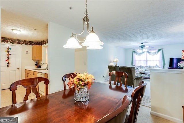 10202 Fairington Ridge Cir, Lithonia, GA 30038 - dining room featuring a ceiling fan and a textured ceiling