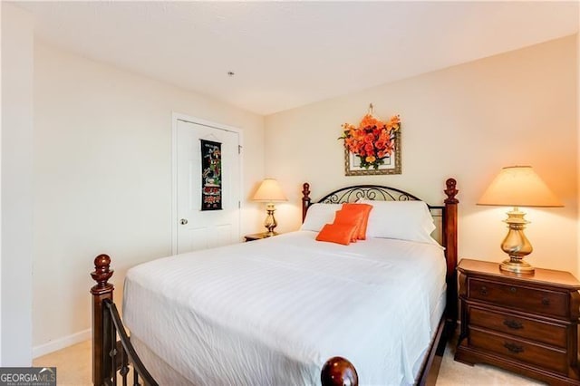 10202 Fairington Ridge Cir, Lithonia, GA 30038 - bedroom with baseboards and light carpet