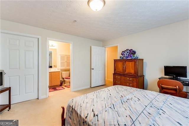 10202 Fairington Ridge Cir, Lithonia, GA 30038 - bedroom featuring light colored carpet, baseboards, and ensuite bath