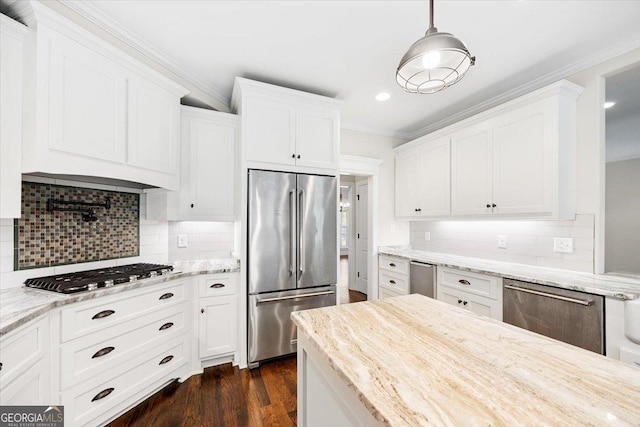 135 Broadleaf Dr, Macon, GA 31210 - kitchen featuring stainless steel appliances, ornamental molding, and white cabinetry