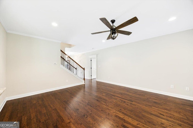 135 Broadleaf Dr, Macon, GA 31210 - unfurnished living room featuring ceiling fan, crown molding, stairway, baseboards, and dark wood-type flooring