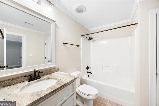 135 Broadleaf Dr, Macon, GA 31210 - bathroom featuring crown molding, visible vents, toilet, and vanity