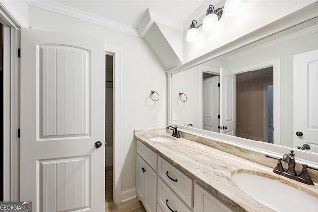 135 Broadleaf Dr, Macon, GA 31210 - full bathroom with a sink, baseboards, ornamental molding, and double vanity