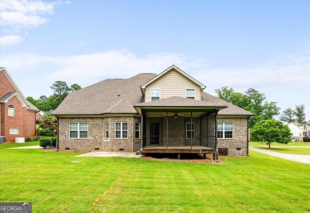 135 Broadleaf Dr, Macon, GA 31210 - rear view of house featuring brick siding, crawl space, a patio area, and a lawn