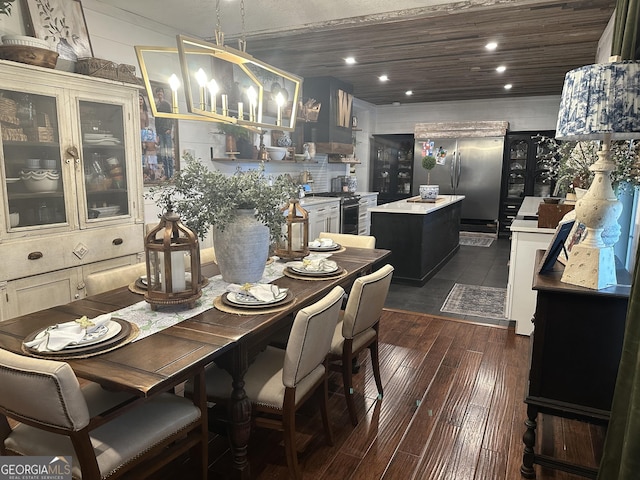 dining area with recessed lighting, wood ceiling, and dark wood-type flooring