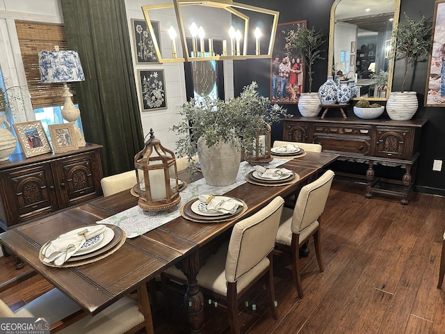 dining space featuring wood finished floors