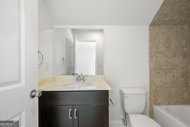 full bath with vanity, baseboards, and toilet