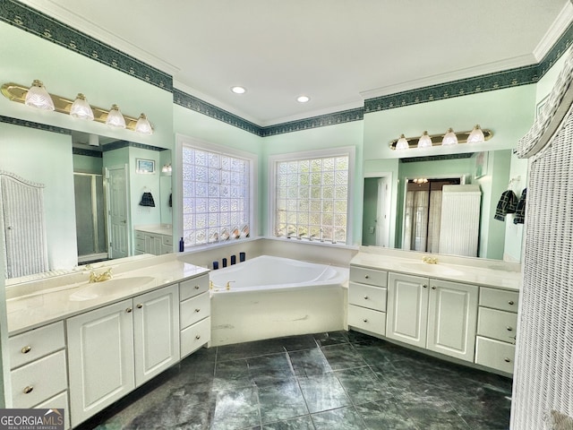 full bath with ornamental molding, a sink, a bath, and a stall shower