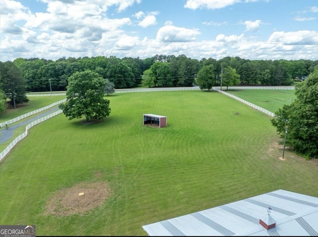 birds eye view of property featuring a rural view