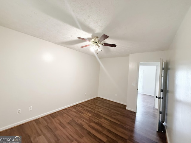 5349 Minnie Lee Dr, Columbus, GA 31907 - unfurnished room featuring dark wood-style floors, a ceiling fan, and a textured ceiling