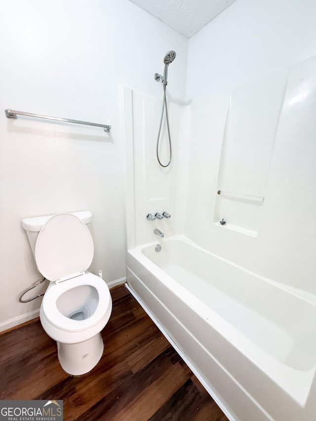 5349 Minnie Lee Dr, Columbus, GA 31907 - bathroom featuring wood finished floors and shower / bath combination