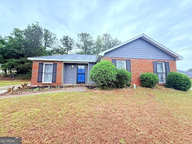 5349 Minnie Lee Dr, Columbus, GA 31907 - view of front of home with brick siding and a front yard