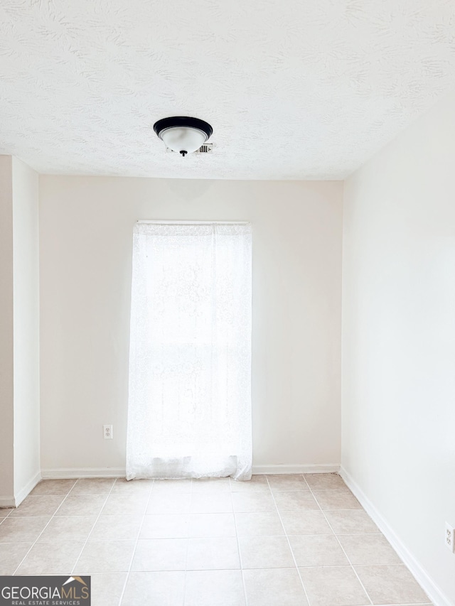 5349 Minnie Lee Dr, Columbus, GA 31907 - unfurnished room featuring light tile patterned floors and a textured ceiling