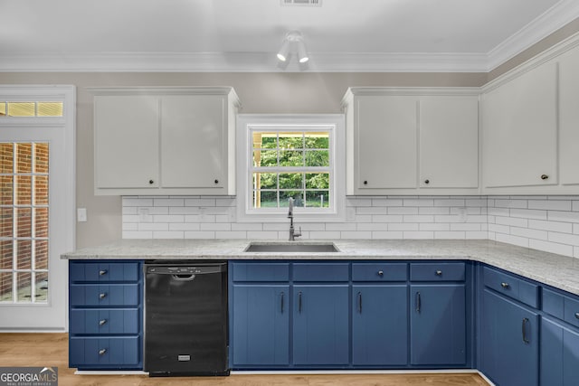 kitchen with decorative backsplash, black dishwasher, white cabinets, a sink, and blue cabinetry