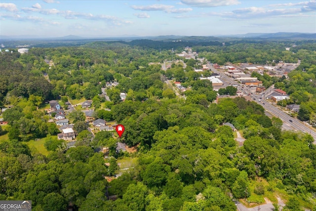 bird's eye view featuring a view of trees