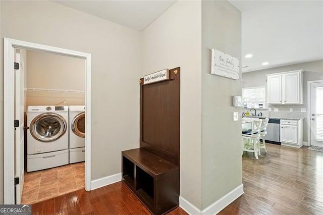 245 Tapestry Dr, Mcdonough, GA 30252 - clothes washing area with laundry area, wood finished floors, baseboards, recessed lighting, and independent washer and dryer