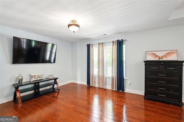 245 Tapestry Dr, Mcdonough, GA 30252 - living area with baseboards and wood finished floors