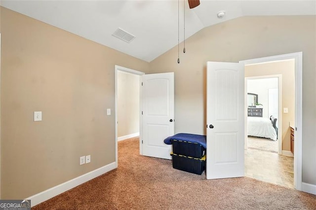 245 Tapestry Dr, Mcdonough, GA 30252 - unfurnished bedroom with visible vents, carpet flooring, baseboards, and vaulted ceiling