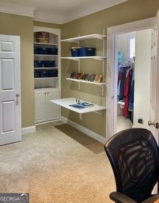 mudroom with baseboards and light carpet