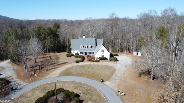 bird's eye view featuring a view of trees