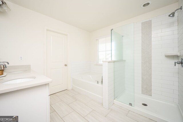 875 Venture Way SW, Atlanta, GA 30331 - bathroom with a sink, a shower stall, and a garden tub