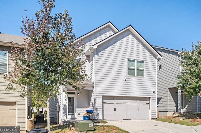 875 Venture Way SW, Atlanta, GA 30331 - view of front of property featuring an attached garage and concrete driveway