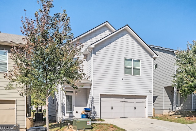 875 Venture Way SW, Atlanta, GA 30331 - view of front of property featuring an attached garage and concrete driveway