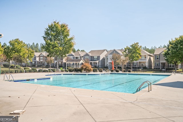 875 Venture Way SW, Atlanta, GA 30331 - community pool with a patio, fence, and a residential view