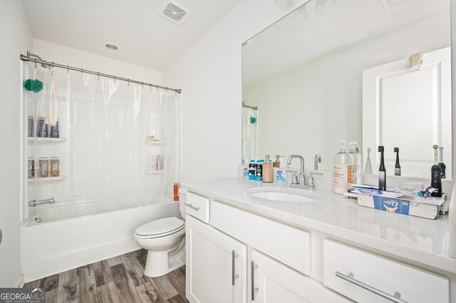 875 Venture Way SW, Atlanta, GA 30331 - full bath with visible vents, shower / bath combo, wood finished floors, vanity, and toilet