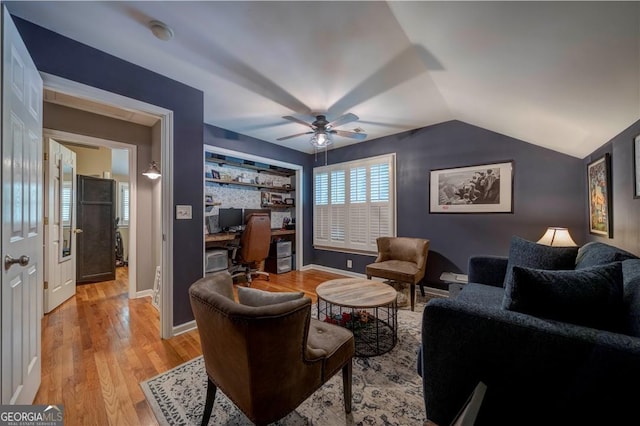 26 Kensington Rd, Avondale Estates, GA 30002 - living area featuring light wood finished floors, a ceiling fan, lofted ceiling, and built in study area