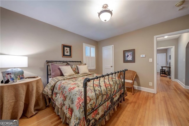 26 Kensington Rd, Avondale Estates, GA 30002 - bedroom with light wood-style flooring and baseboards
