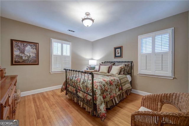 26 Kensington Rd, Avondale Estates, GA 30002 - bedroom featuring baseboards and light wood-type flooring