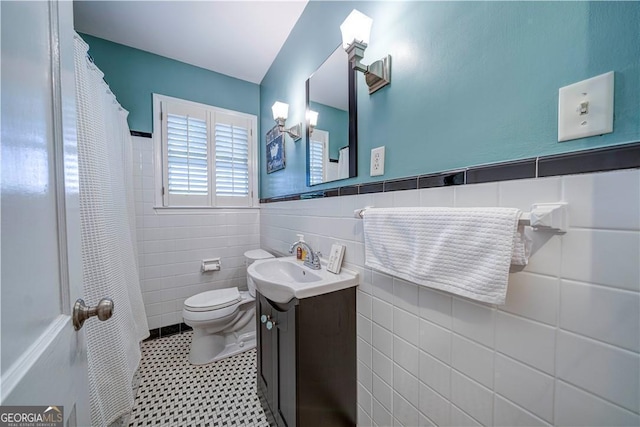 26 Kensington Rd, Avondale Estates, GA 30002 - bathroom with tile walls, vanity, a wainscoted wall, and a shower with curtain