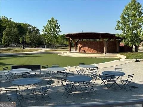 view of community featuring a gazebo and a game area