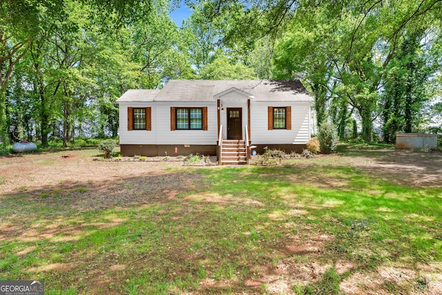 view of front facade featuring a front lawn and crawl space