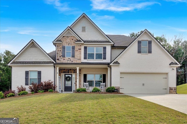 4575 Birch Way, Loganville, GA 30052 - view of front facade with brick siding, concrete driveway, covered porch, an attached garage, and a front yard