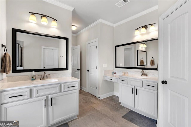 4575 Birch Way, Loganville, GA 30052 - full bath featuring two vanities, crown molding, and baseboards