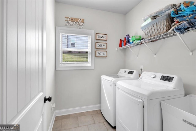 4575 Birch Way, Loganville, GA 30052 - clothes washing area with washing machine and dryer and baseboards